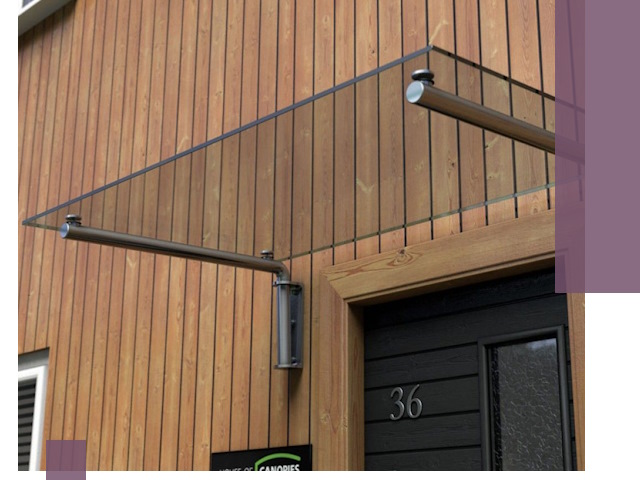 Стеклянные козырьки на входы и фасады в Осинниках